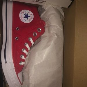 Red mid top converse